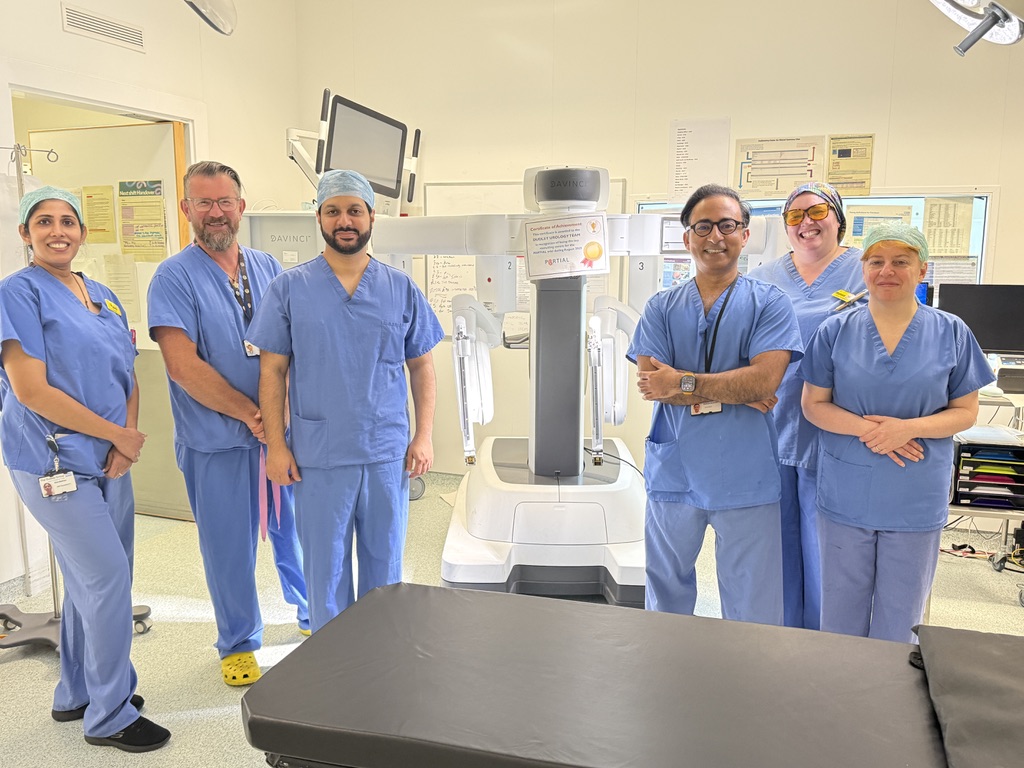 Mr Syed Ali Shahzad with the robotic surgery theatre team